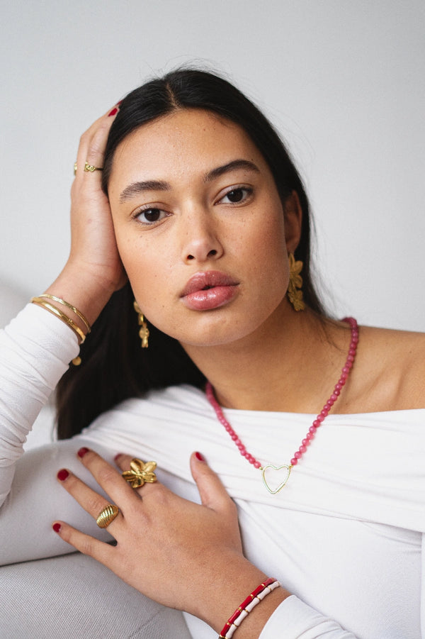 Roze stenen kralen ketting met hart bedel