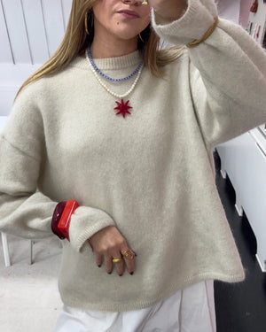 Witte stenen ketting met rode zon glas bedel