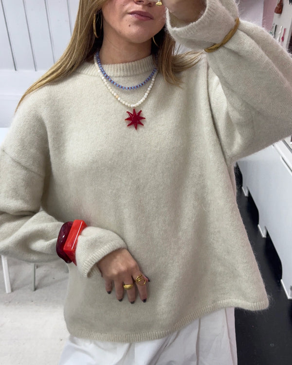 Witte stenen ketting met rode zon glas bedel