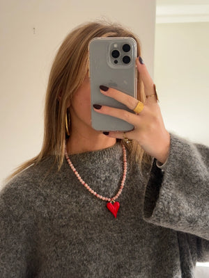 Roze stenen ketting met rood hart