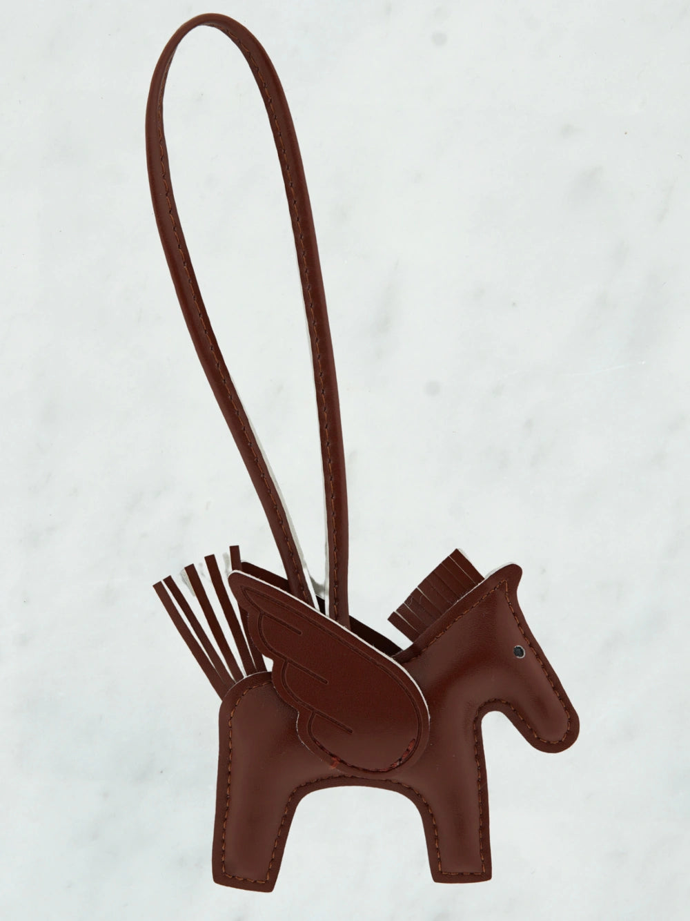 Flying horse bag charm brown