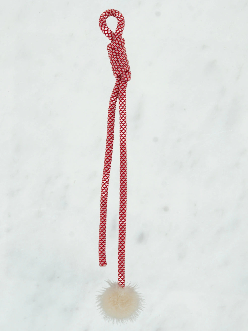 Funky long tie with pom pom