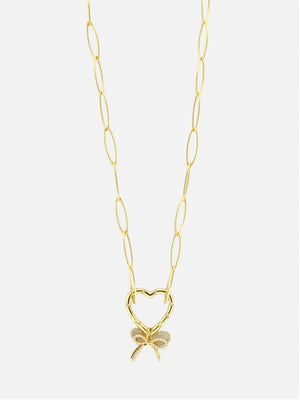 Necklace with heart and pearl bow