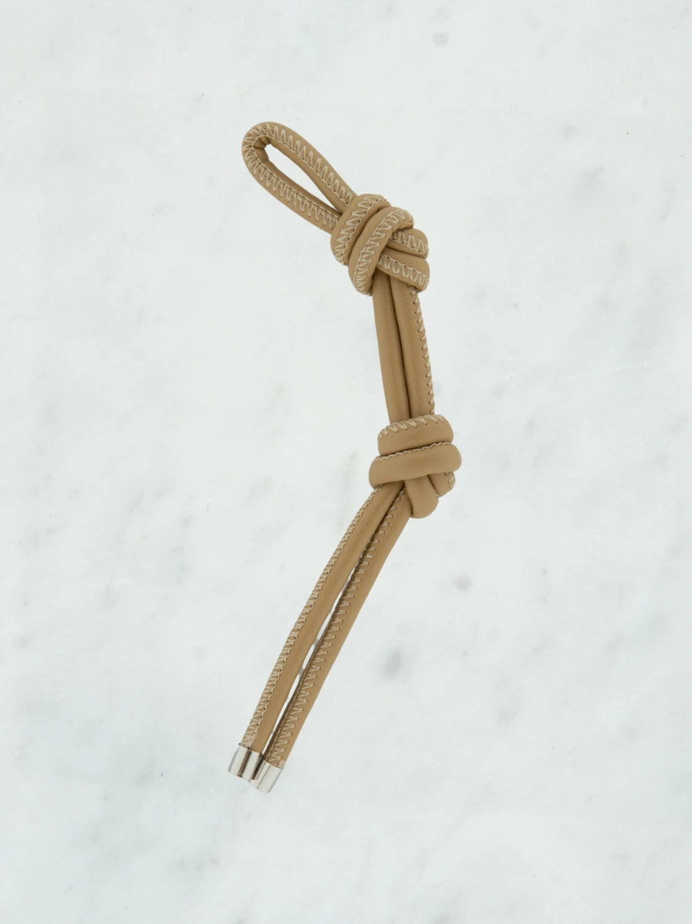 Knotted shiny tie