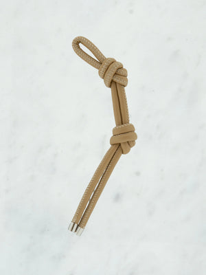 Knotted shiny tie