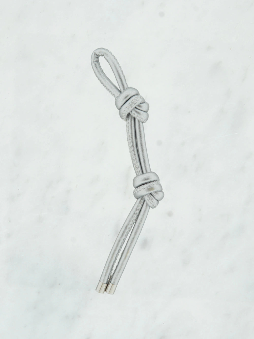 Knotted shiny tie